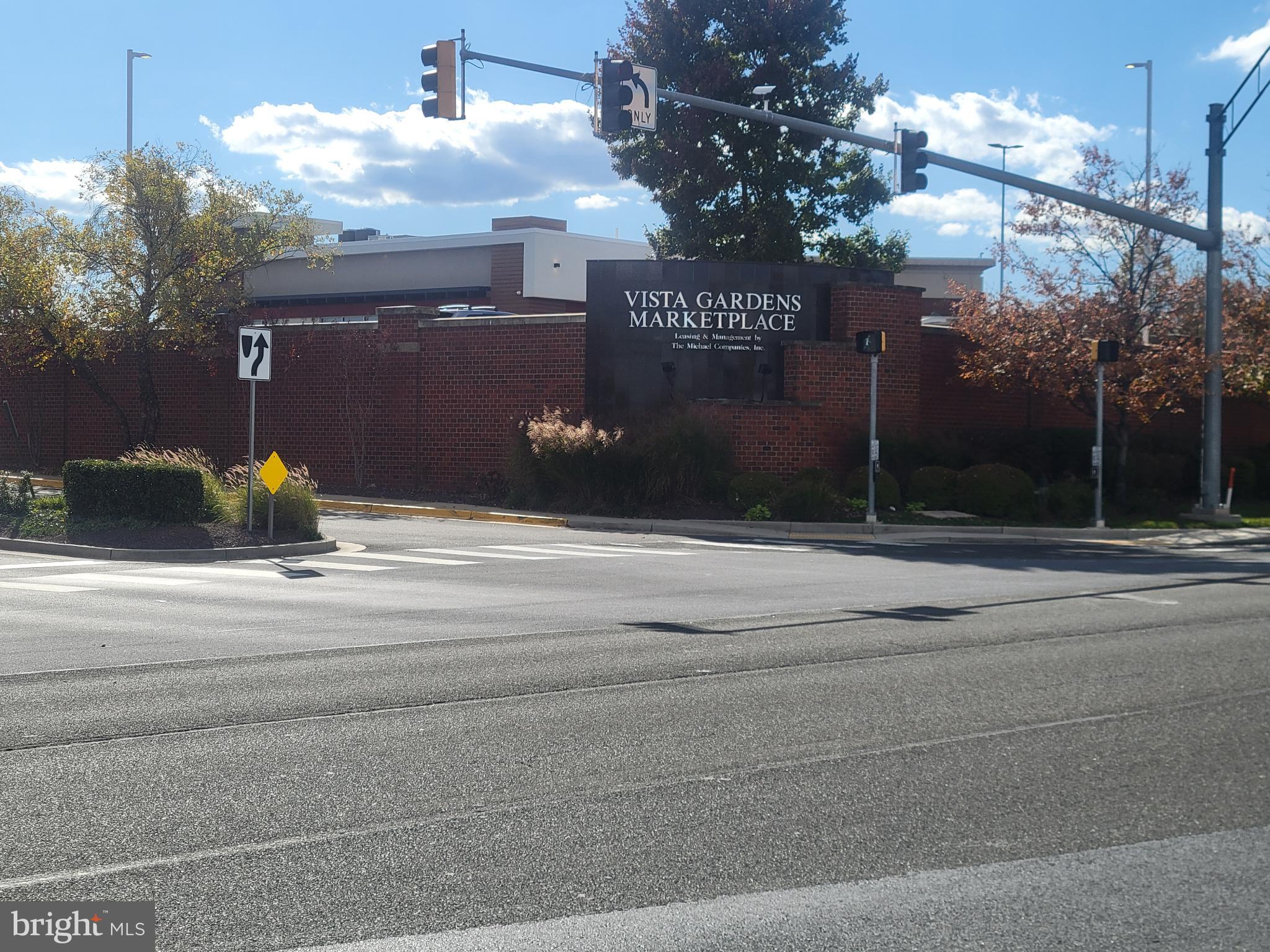 4634 Deepwood Court, Unit 89E Bowie, MD 20720 - Photo 29 of 29 a sign that is on the side of a road