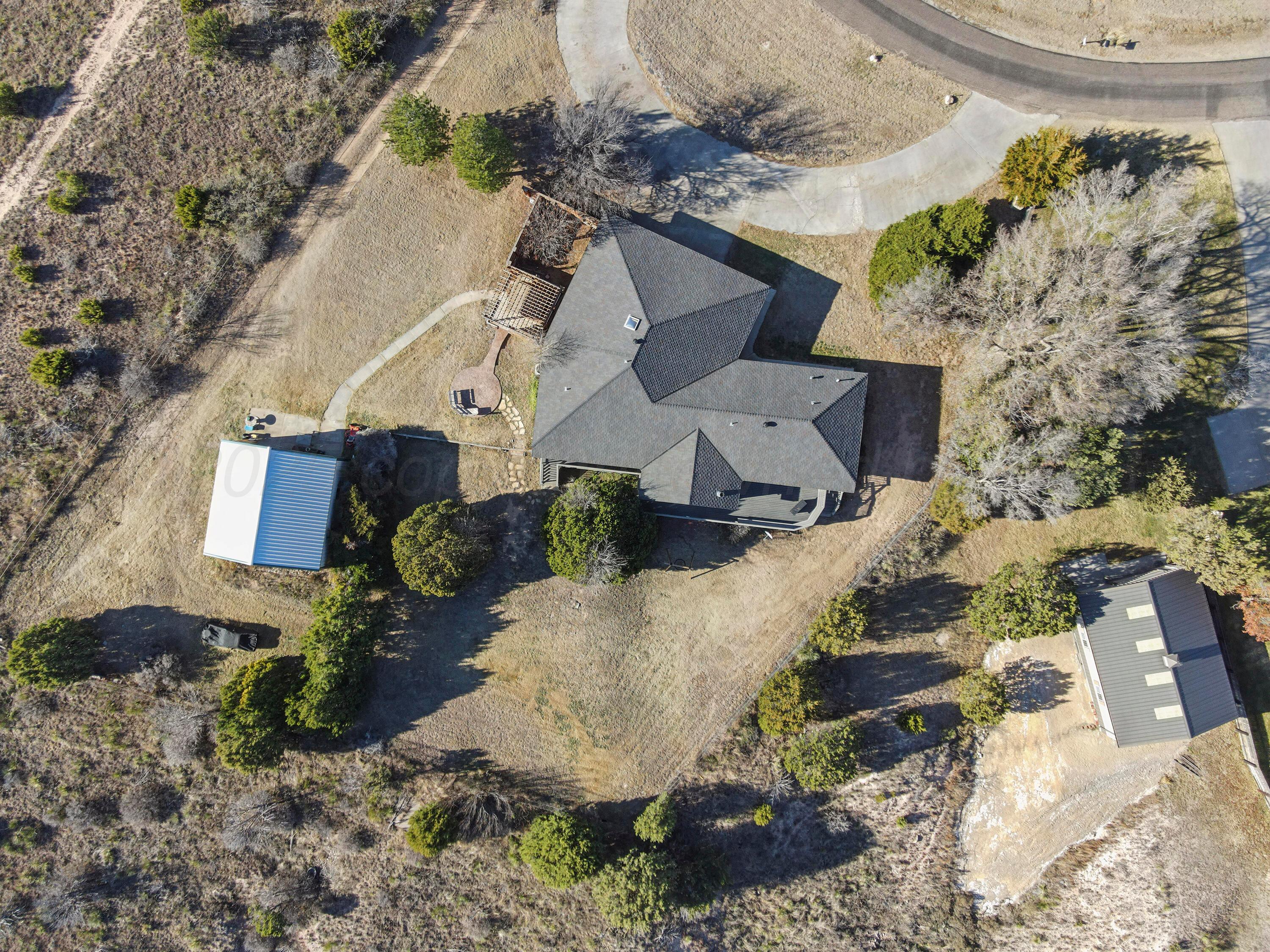 13901 Tangle Aire Point Amarillo, TX 79118 - Photo 54 of 55 an aerial view of a house with a yard