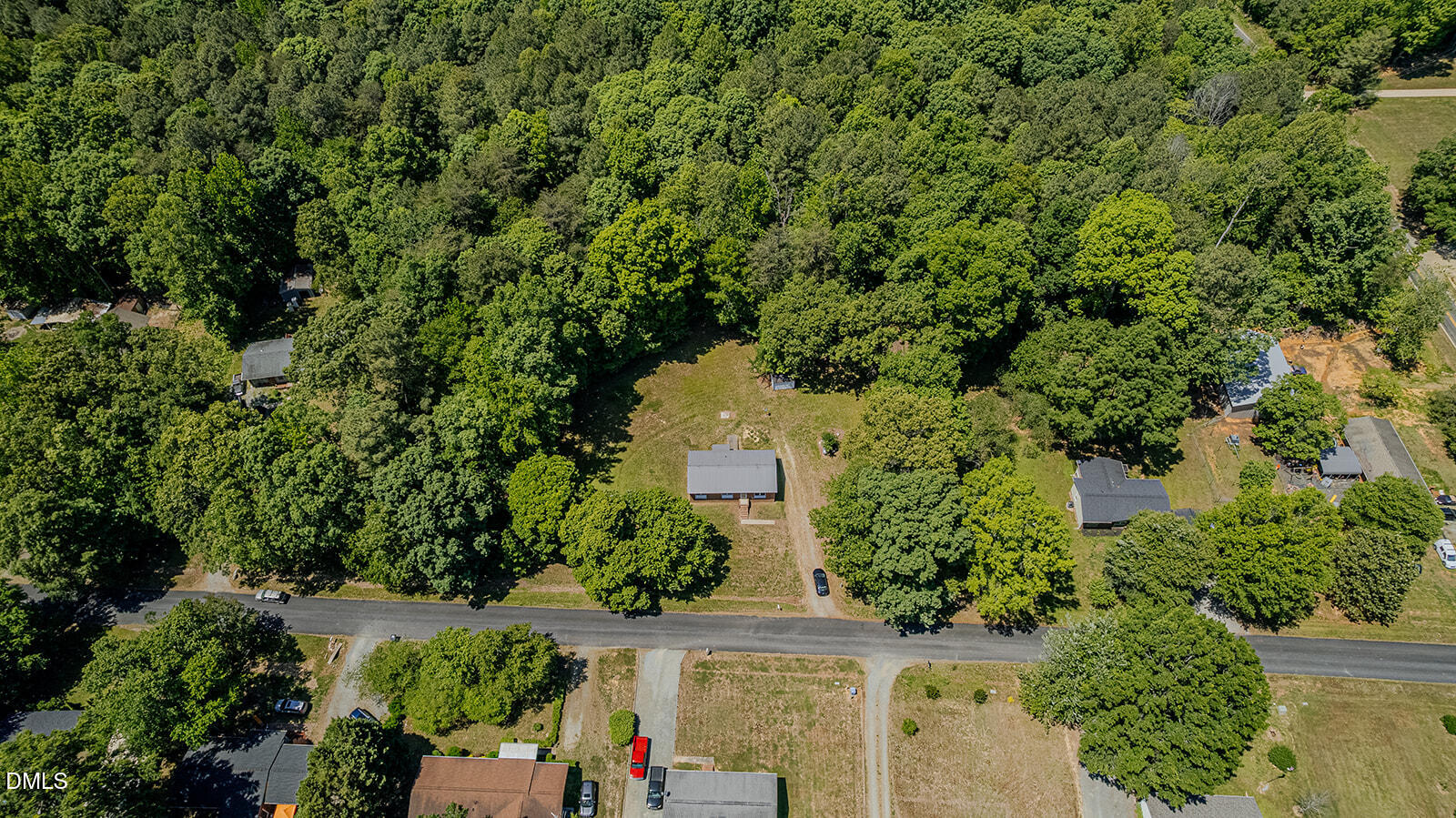 1302 Blacksmith Road Efland, NC 27243 - Photo 38 of 46 an aerial view of a house with a yard