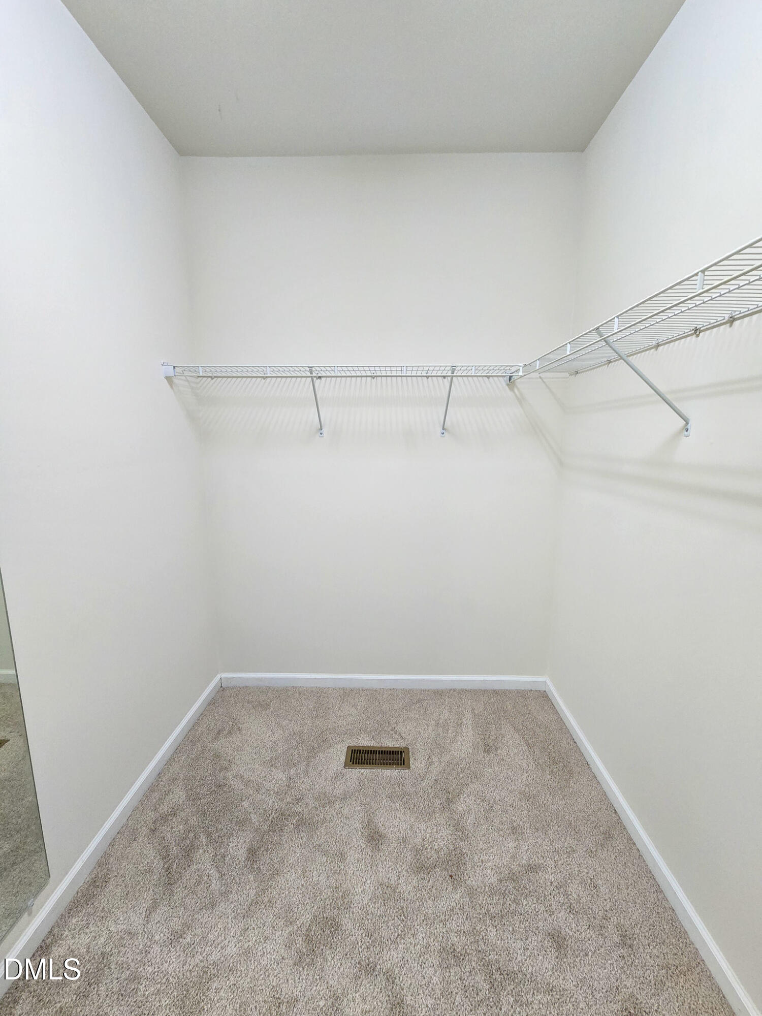 6145 Beale Loop Raleigh, NC 27616 - Photo 22 of 36 a view of a room with racks on the wall