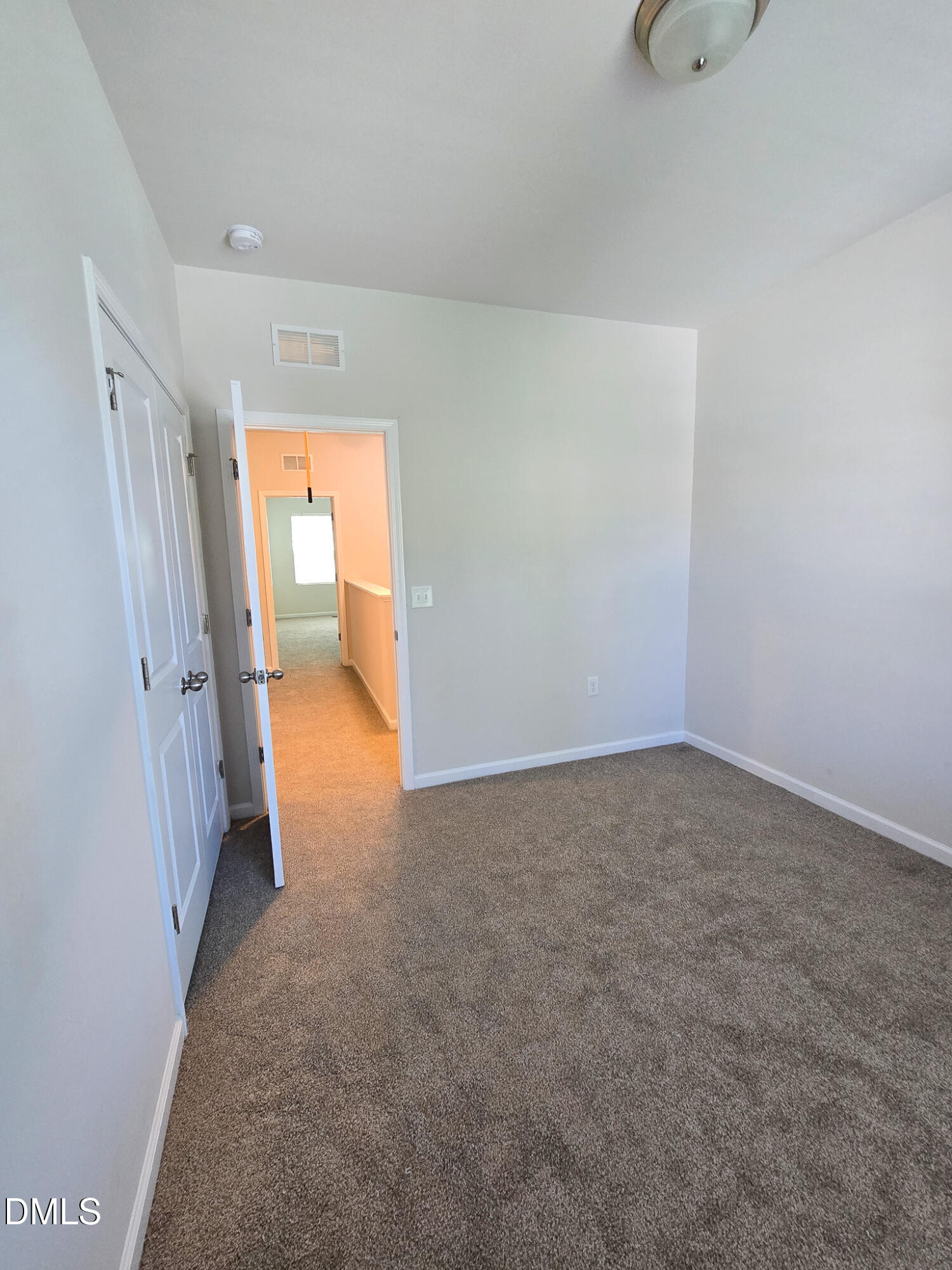 6145 Beale Loop Raleigh, NC 27616 - Photo 28 of 36 a view of an empty room