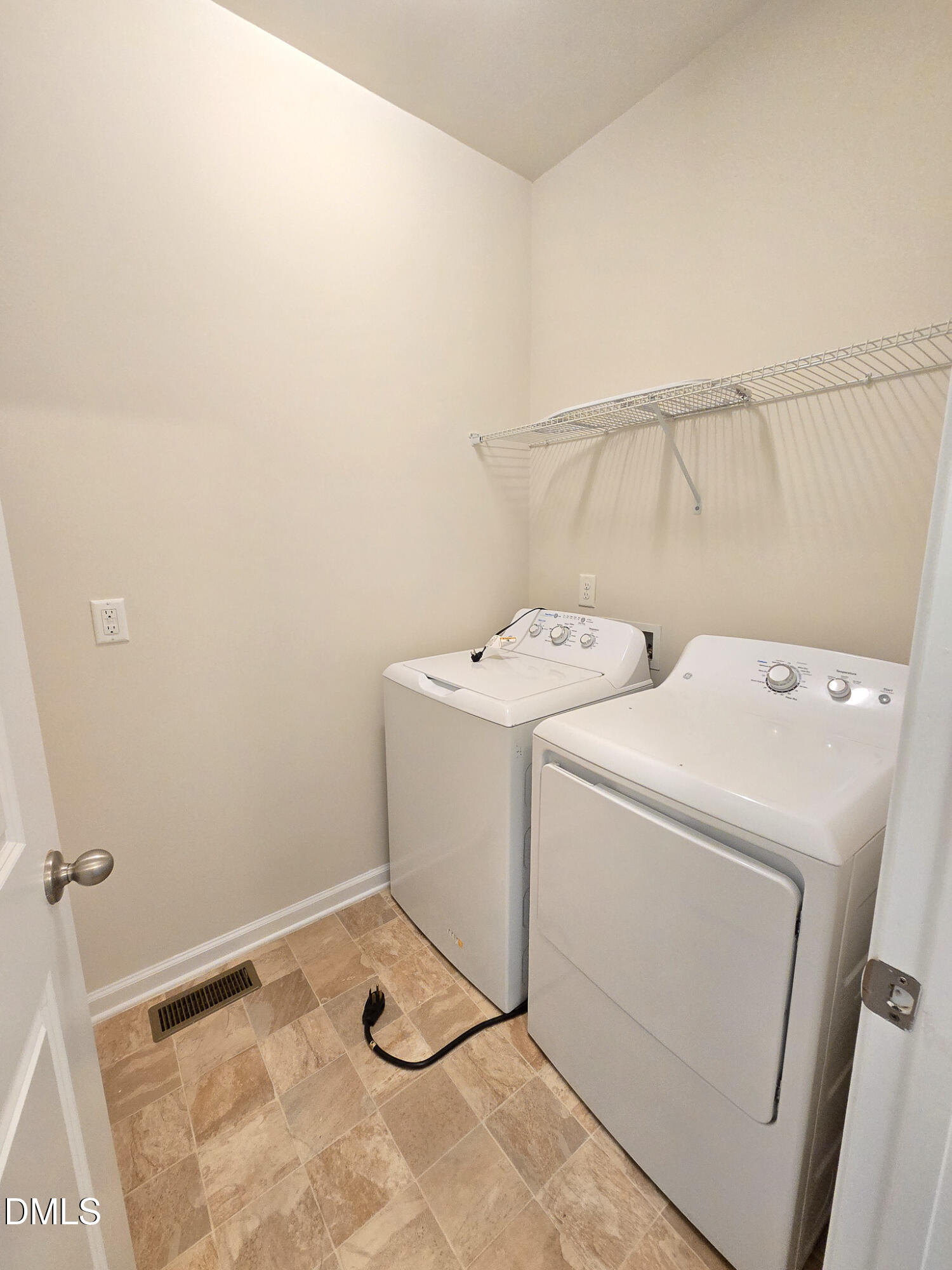 6145 Beale Loop Raleigh, NC 27616 - Photo 34 of 36 a utility room with dryer and washer