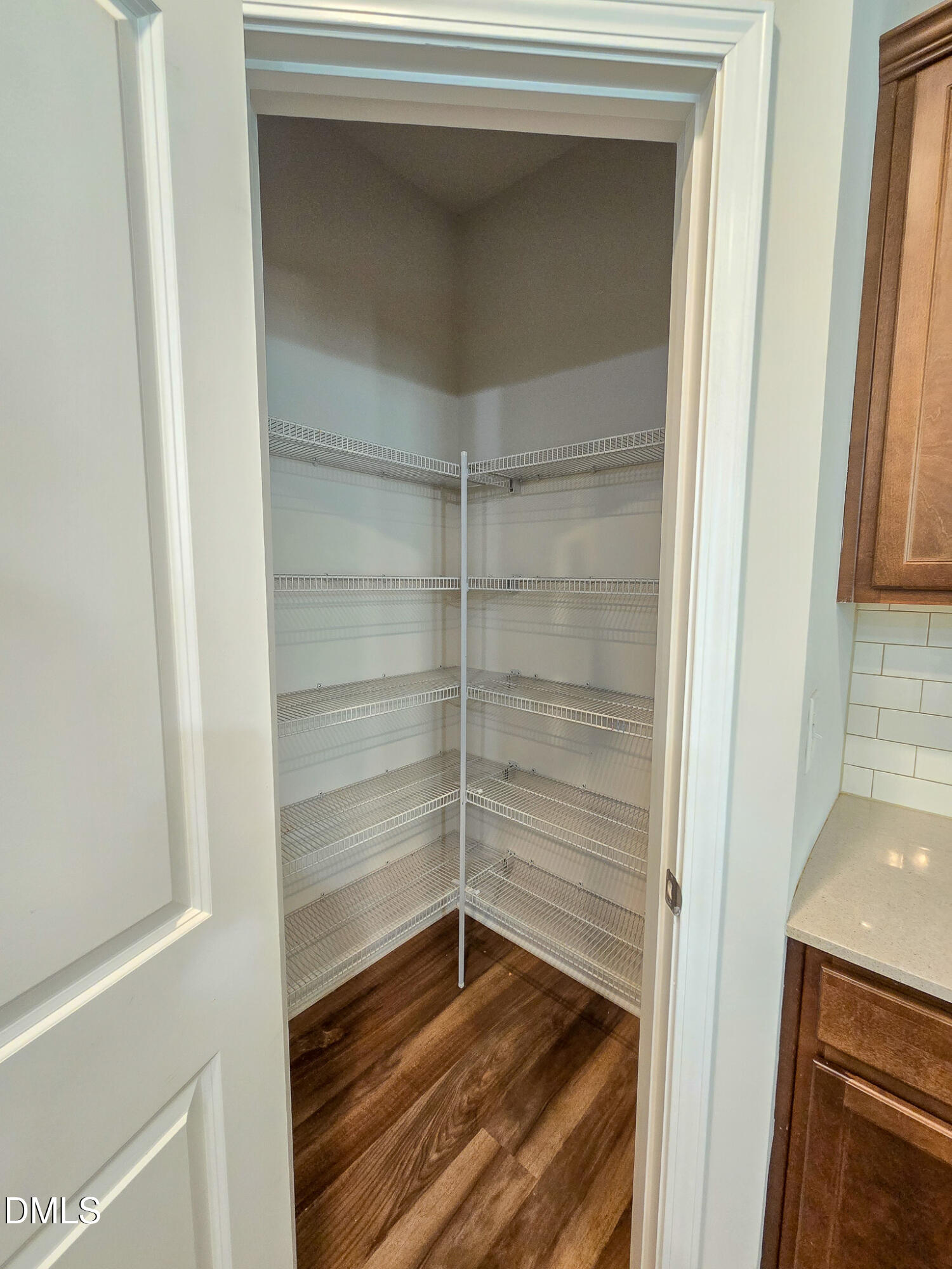 6145 Beale Loop Raleigh, NC 27616 - Photo 10 of 36 a empty room with a wooden floor