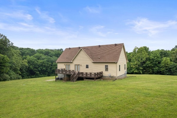4664 New Cut Road Greenbrier, TN 37073 - Photo 49 of 85 a view of a house with a big yard plants and large trees