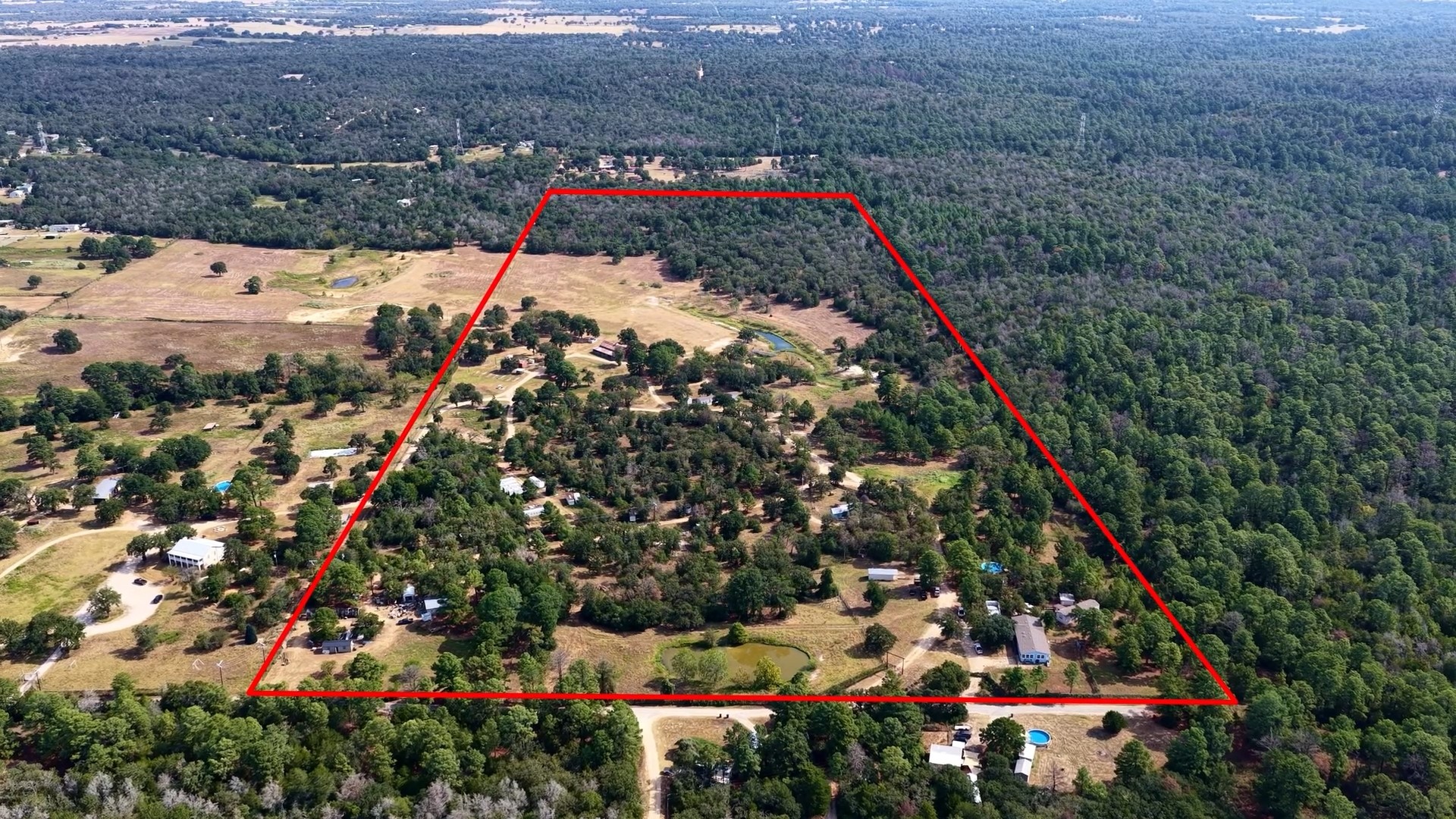 218 Little Ranch Road Red Rock, TX 78662 - Photo 2 of 33 Thick woods and open pastures define this vast countryside acreage.