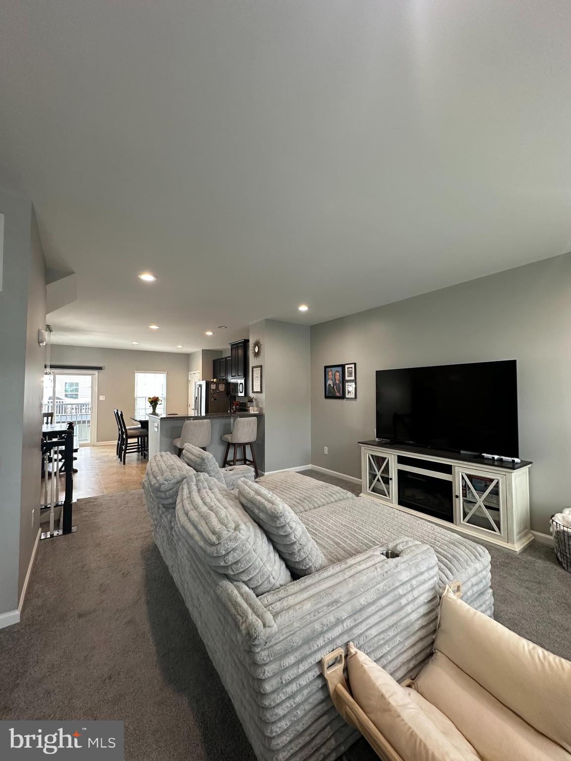 1043 Regency Place Sewell, NJ 08080 - Photo 11 of 24 a living room with furniture and a flat screen tv
