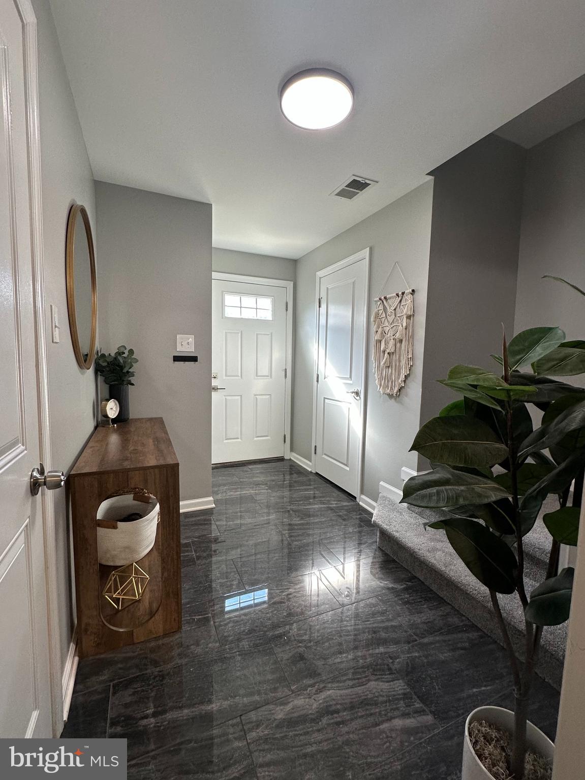 1043 Regency Place Sewell, NJ 08080 - Photo 3 of 24 a view of a livingroom with furniture and wooden floor