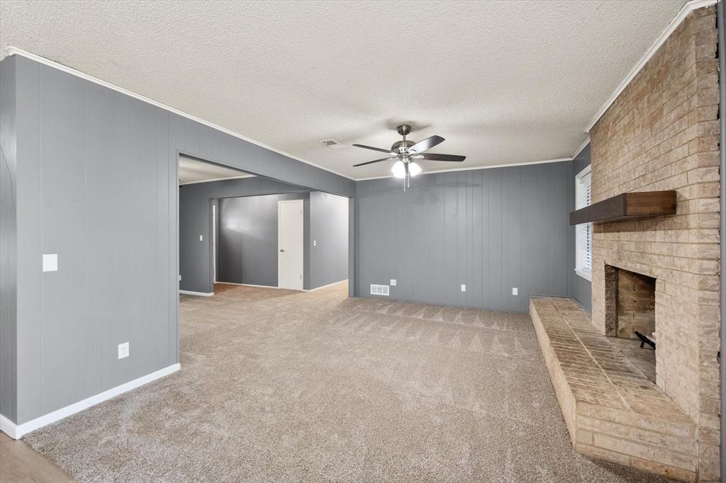 536 Robindale Lane Fairfield, TX 75840 - Photo 13 of 38 a view of an empty room with chandelier fan