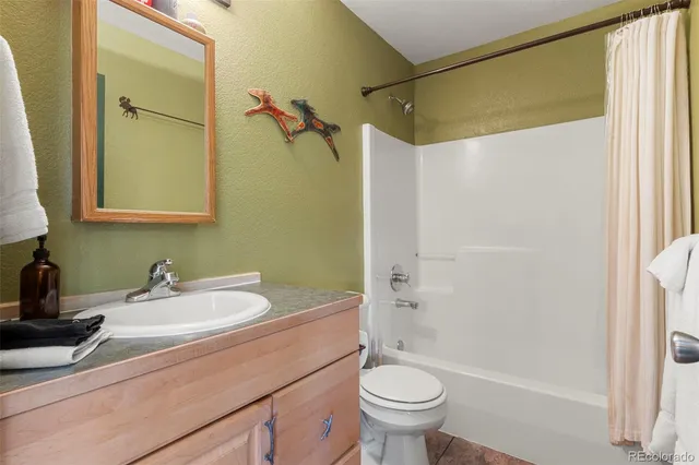 a bedroom with a bed and furniture