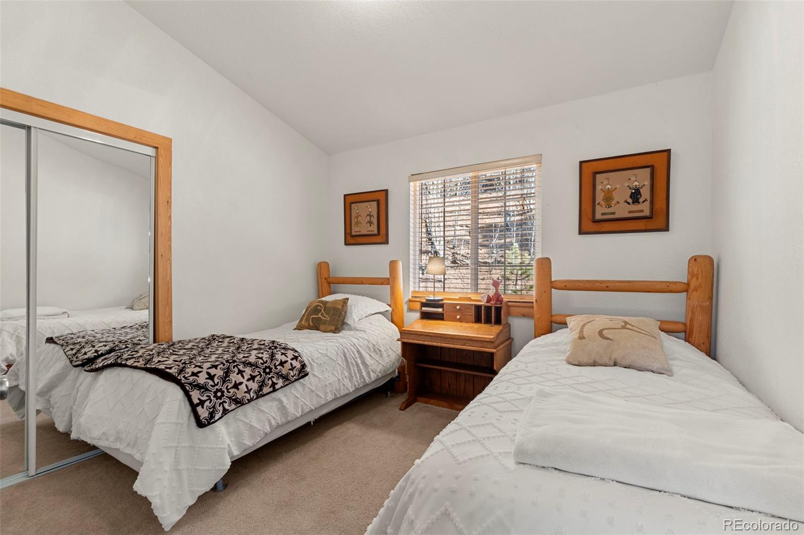 114 Hall Road Bailey, CO 80421 - Photo 13 of 21 a bedroom with two beds and a large window