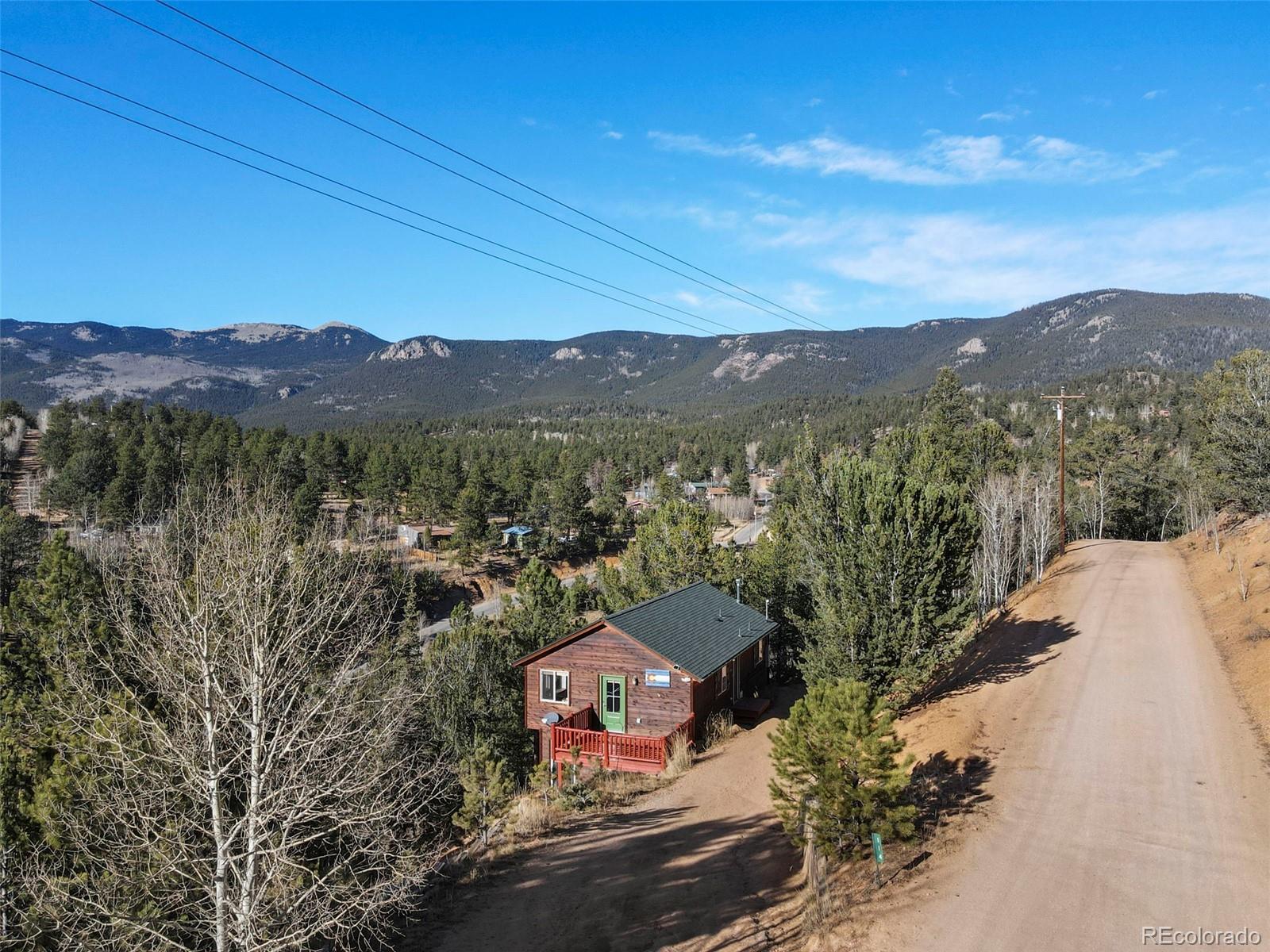 114 Hall Road Bailey, CO 80421 - Photo 17 of 21 a view of a city with mountain