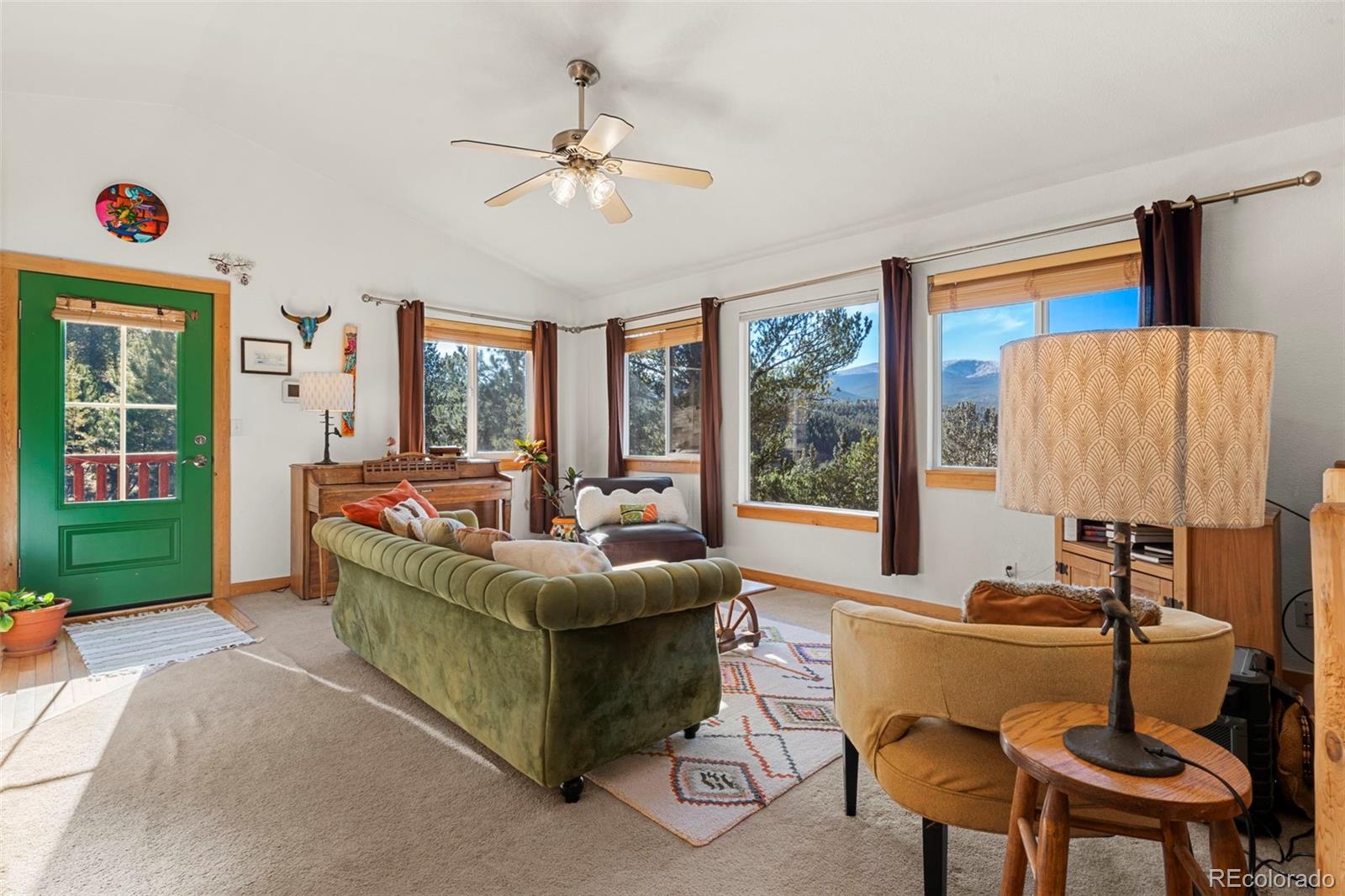 114 Hall Road Bailey, CO 80421 - Photo 10 of 21 a living room with furniture and a large window