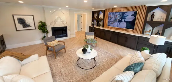 a kitchen with stainless steel appliances a stove a microwave and cabinets