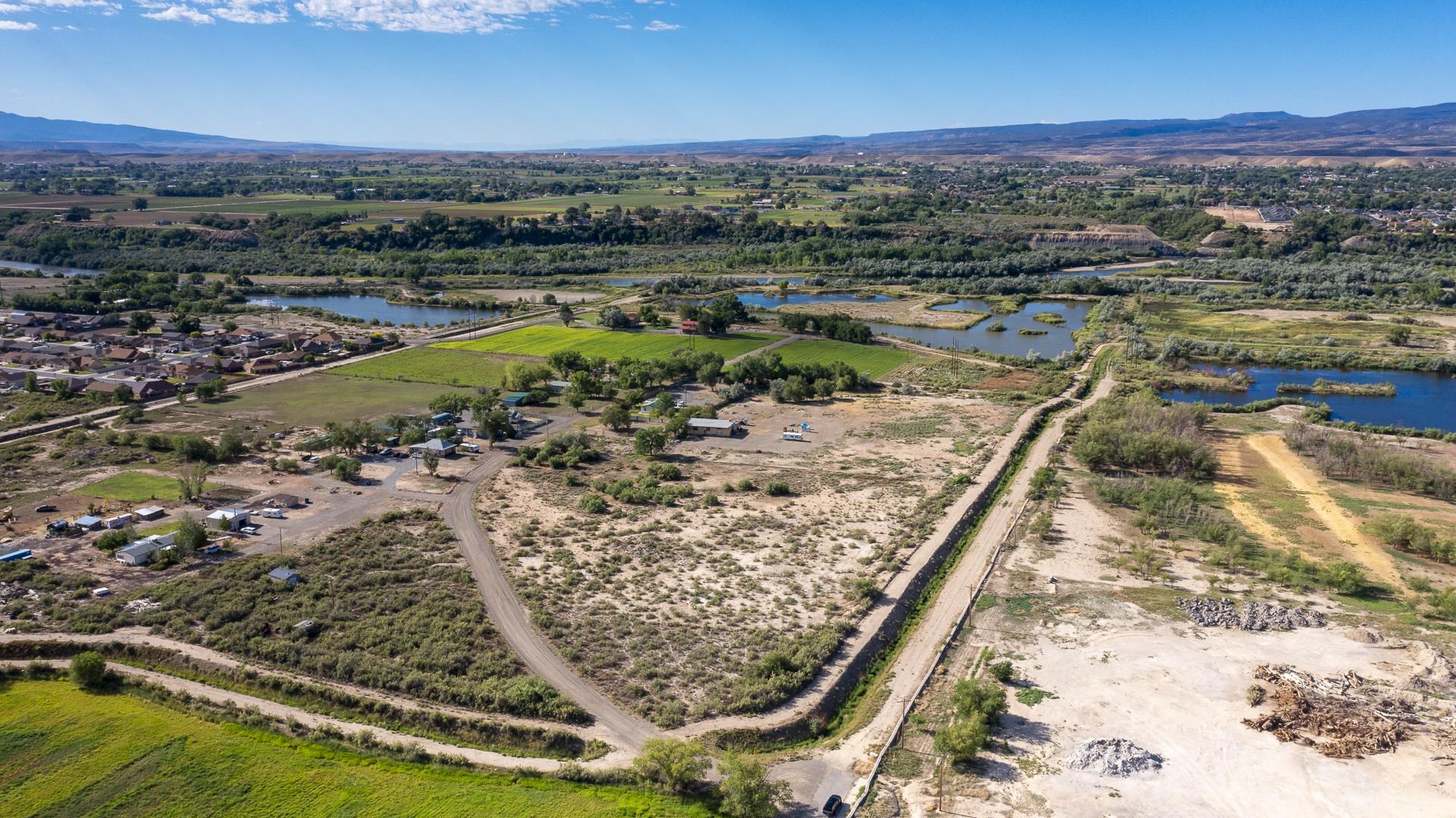 359 29 5/8 Road Grand Junction, CO 81504 - Photo 7 of 13 a view of a lake with a mountain