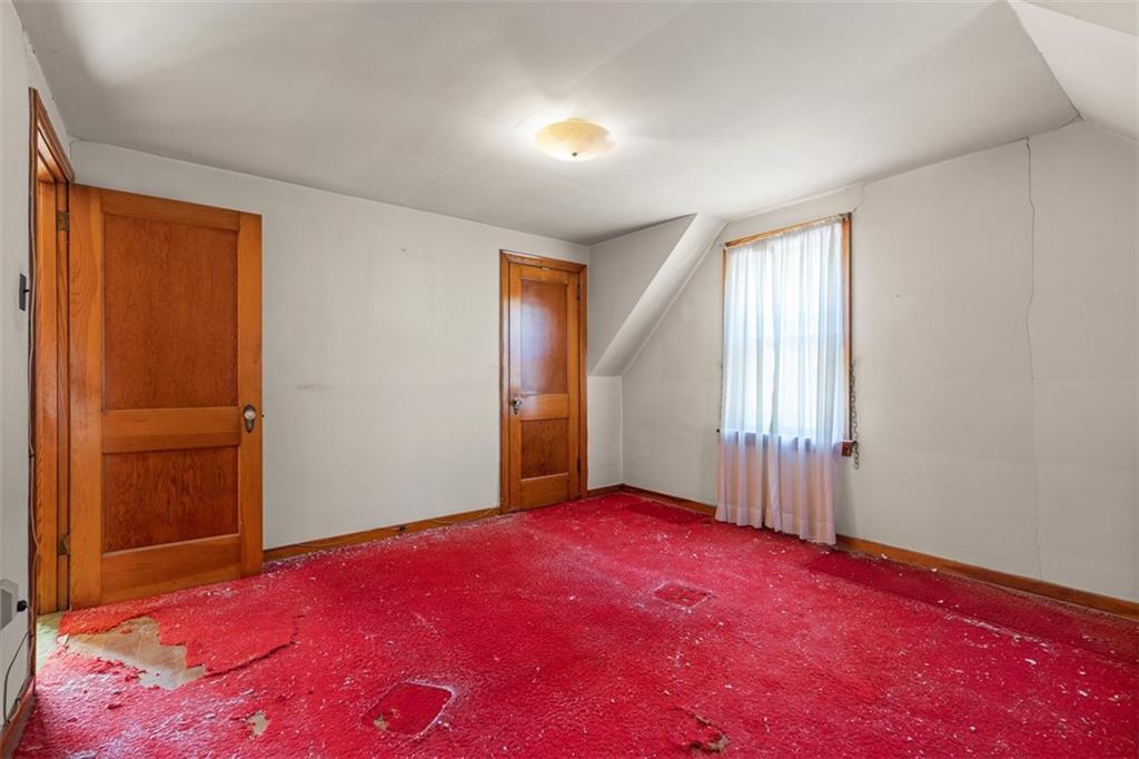 1645 Charlton Heights Road Coraopolis, PA 15108 - Photo 19 of 49 an empty room with windows and closet