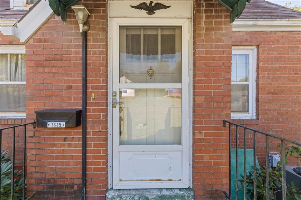 1645 Charlton Heights Road Coraopolis, PA 15108 - Photo 2 of 49 a view of front door of house