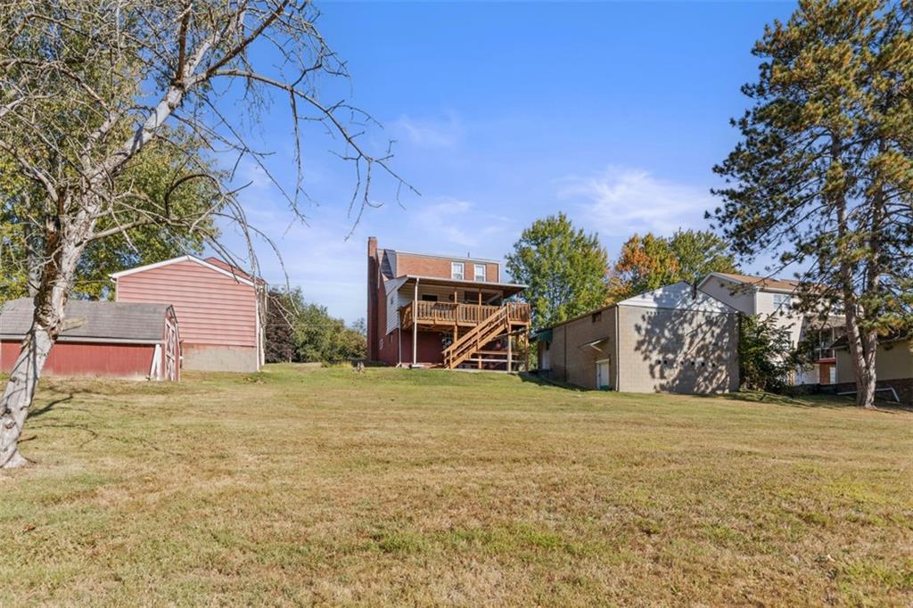 1645 Charlton Heights Road Coraopolis, PA 15108 - Photo 35 of 49 a view of a field with some trees in front of it