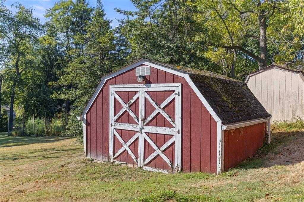1645 Charlton Heights Road Coraopolis, PA 15108 - Photo 36 of 49 a front view of a house with garden