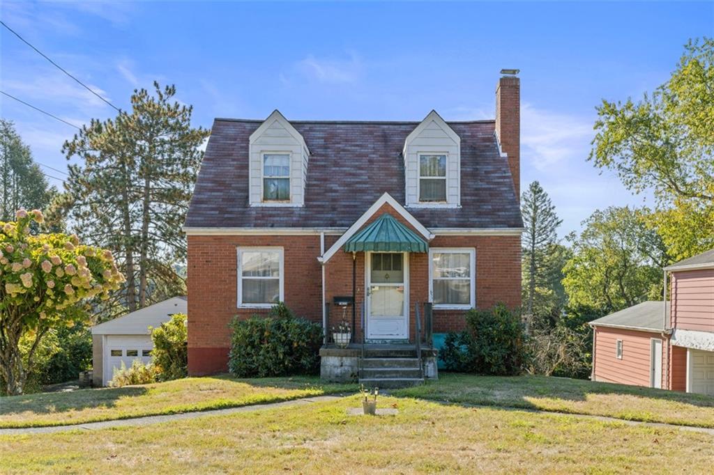 1645 Charlton Heights Road Coraopolis, PA 15108 - Photo 48 of 49 a front view of a house with a yard
