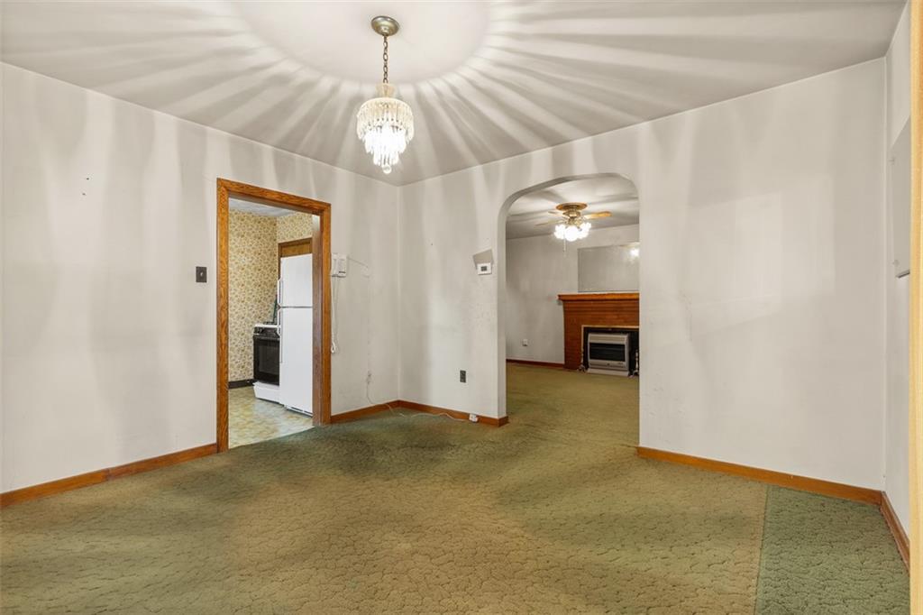 1645 Charlton Heights Road Coraopolis, PA 15108 - Photo 7 of 49 a view of a chandelier in big room and chandelier fan