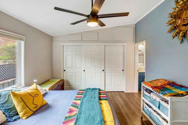 a bed room with a bed and a couch