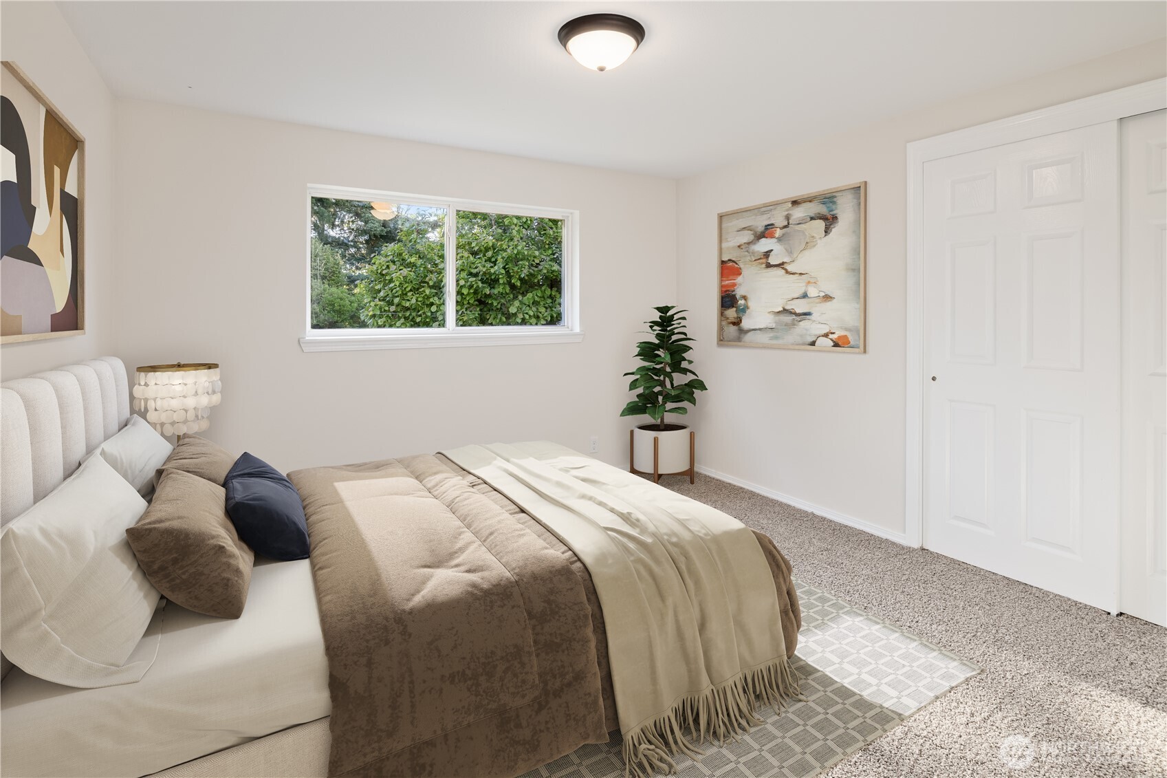 1003 9th Street Northwest Puyallup, WA 98371 - Photo 17 of 40 a bedroom with a bed and a window