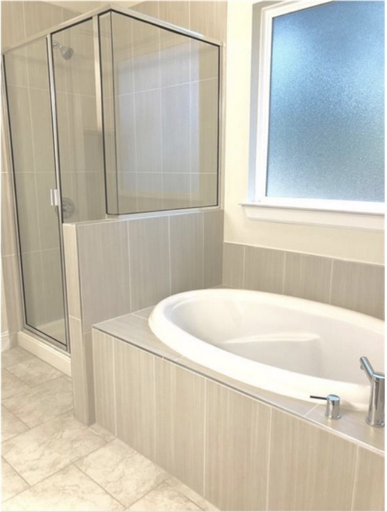 8813 Moccasin Path Austin, TX 78736 - Photo 5 of 10 Full bathroom featuring a garden tub and a stall shower