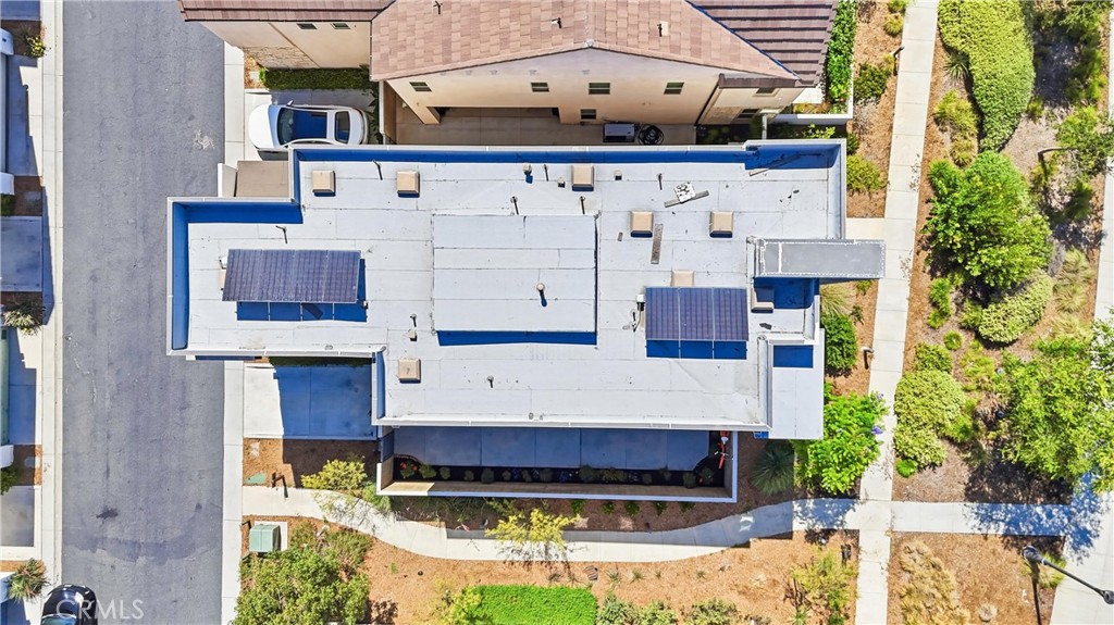 182 Scale Irvine, CA 92618 - Photo 54 of 61 The footprint tells the story. Solar panels, a generous rear courtyard, and a two car garage + 1 all working together in one tight, efficient package.