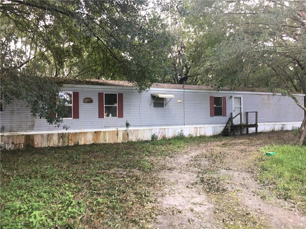 1818 Ritter Road Lakeland, FL 33810 - Photo 1 of 1 a view of a house with a yard