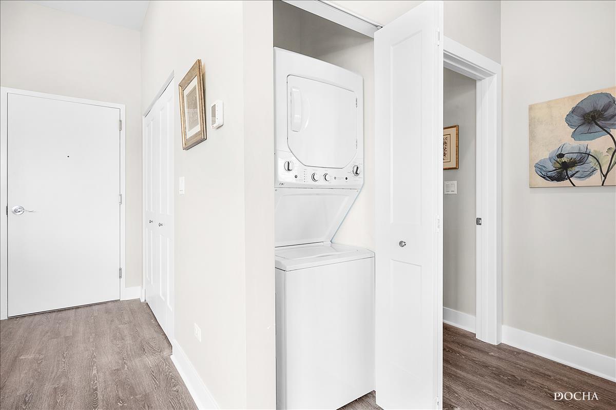 1101 Ritter Street, Unit 314 North Aurora, IL 60542 - Photo 8 of 11 a view of a storage & utility room with wooden floor