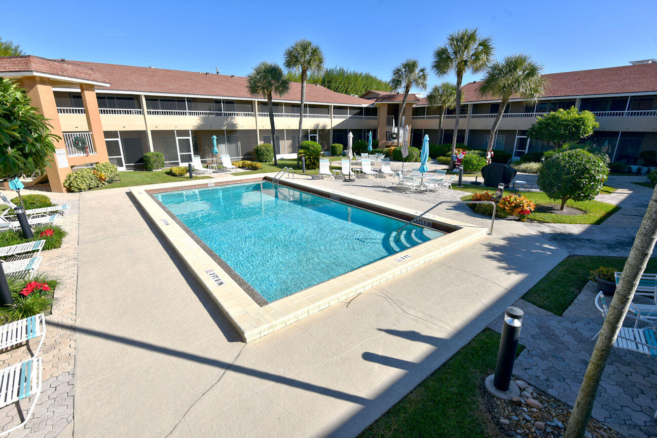 1100 Surf Road, Unit 202 Riviera Beach, FL 33404 - Photo 12 of 32 Heated Pool
