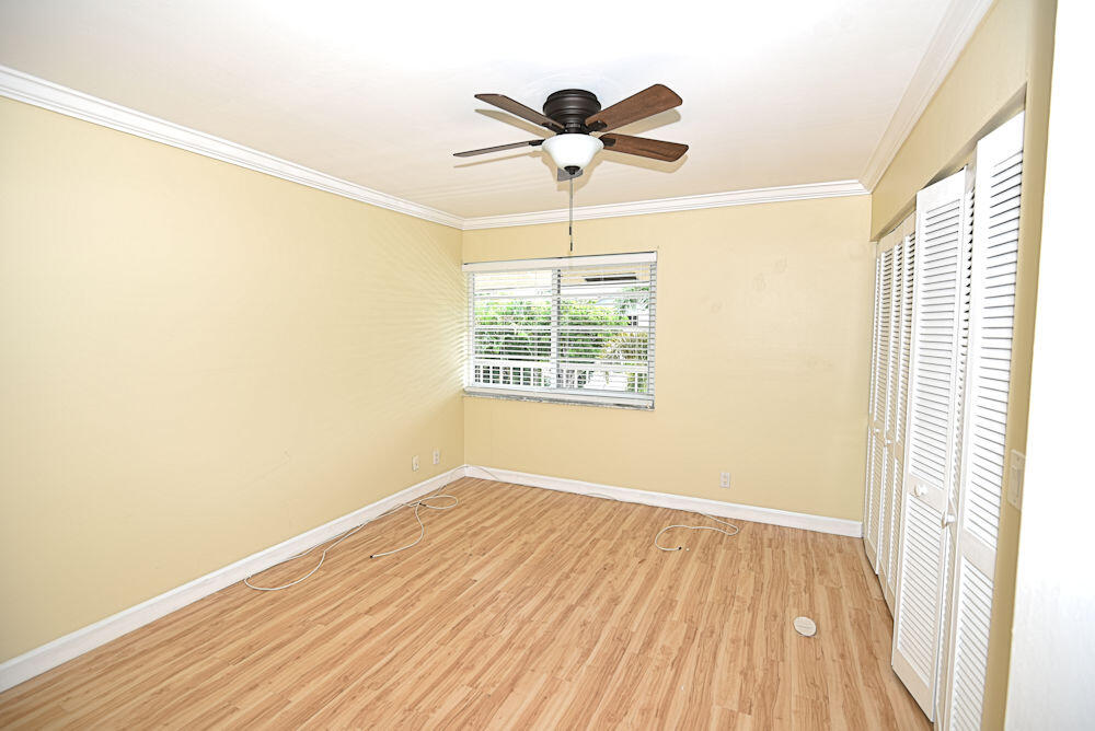 1100 Surf Road, Unit 202 Riviera Beach, FL 33404 - Photo 17 of 32 Guest Bedroom