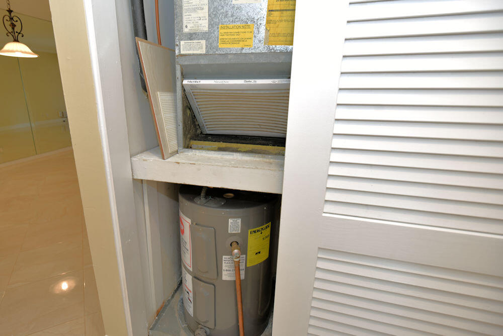 1100 Surf Road, Unit 202 Riviera Beach, FL 33404 - Photo 20 of 32 Hot water / AC