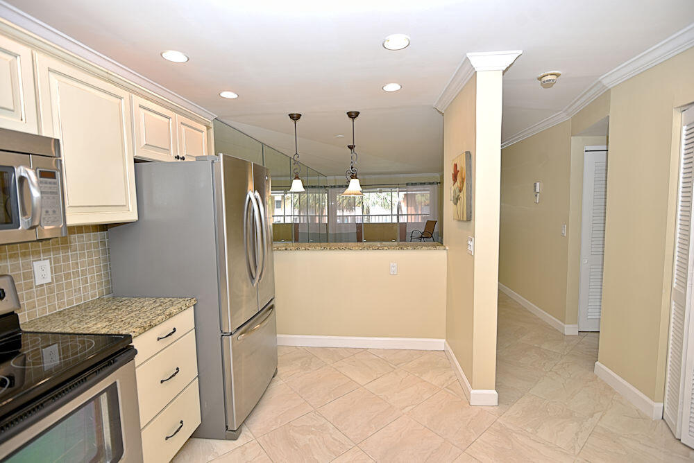 1100 Surf Road, Unit 202 Riviera Beach, FL 33404 - Photo 4 of 32 kitchen