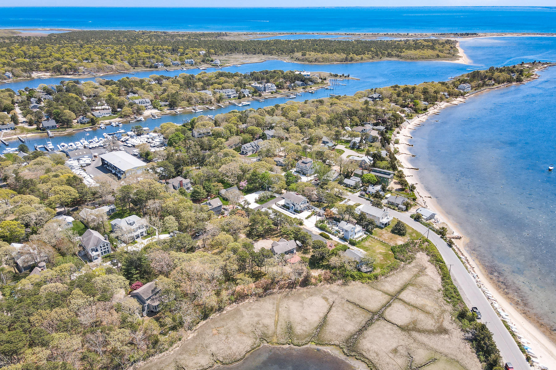 7 Slipper Shell Way Mashpee, MA 02649 - Photo 20 of 27 a view of a city with an ocean