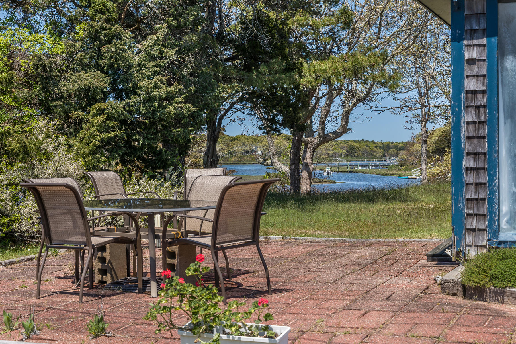7 Slipper Shell Way Mashpee, MA 02649 - Photo 6 of 27 a view of a chairs and table in the patio