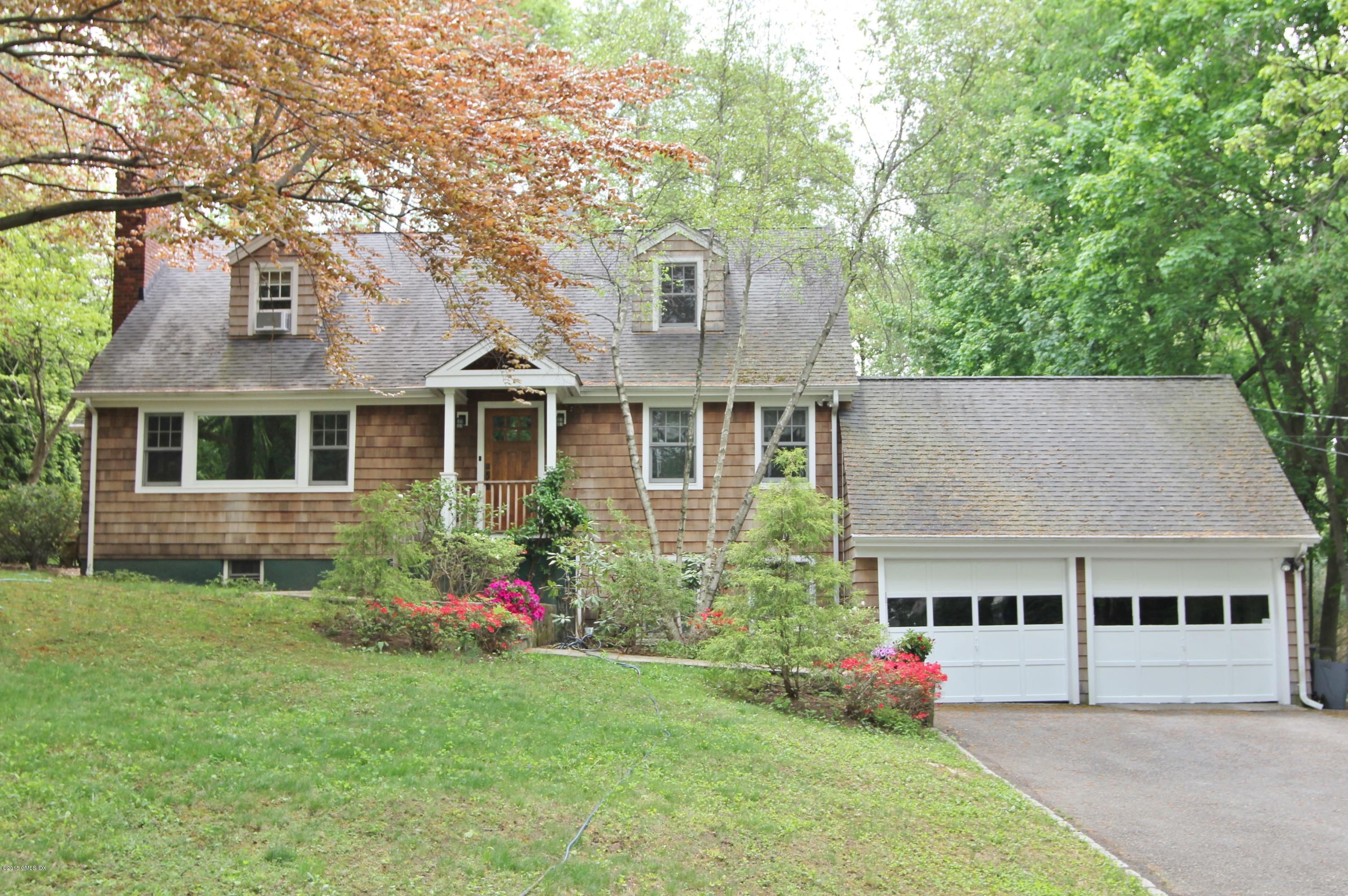 7 Anderson Road Greenwich, CT 06830 - Photo 1 of 23 a front view of house with yard