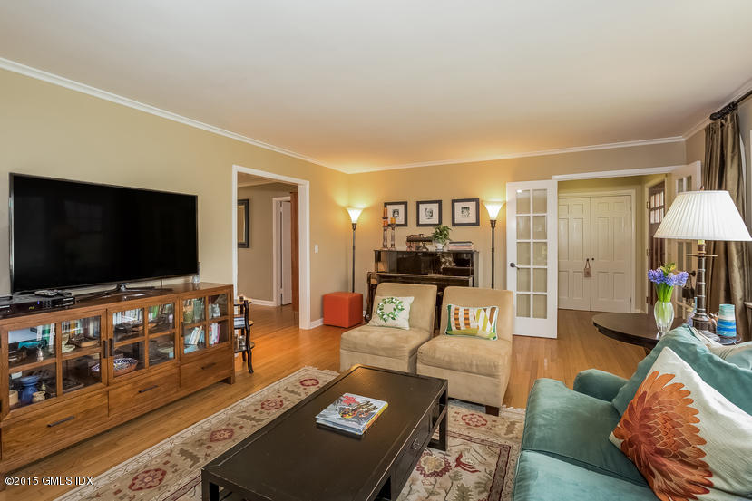 7 Anderson Road Greenwich, CT 06830 - Photo 4 of 23 a living room with furniture and a flat screen tv