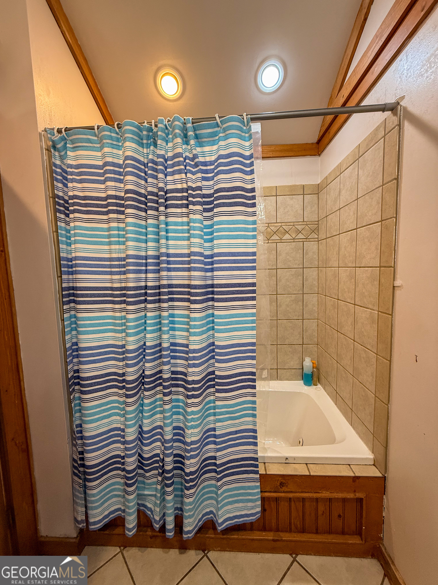 170 Hillcrest Street Cornelia, GA 30531 - Photo 12 of 18 a bathroom with a sink and shower