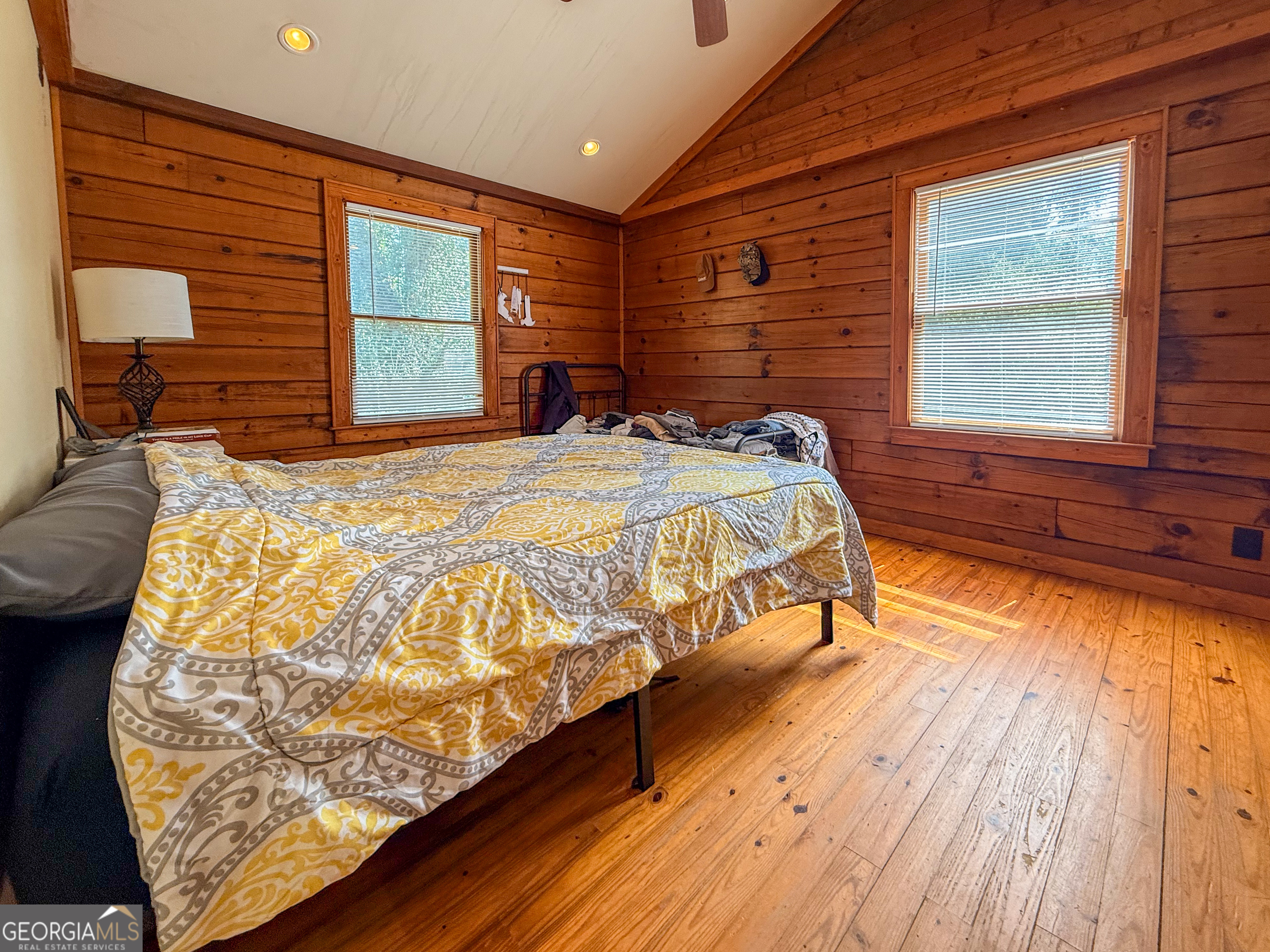 170 Hillcrest Street Cornelia, GA 30531 - Photo 13 of 18 a bed sitting in a bedroom next to a window