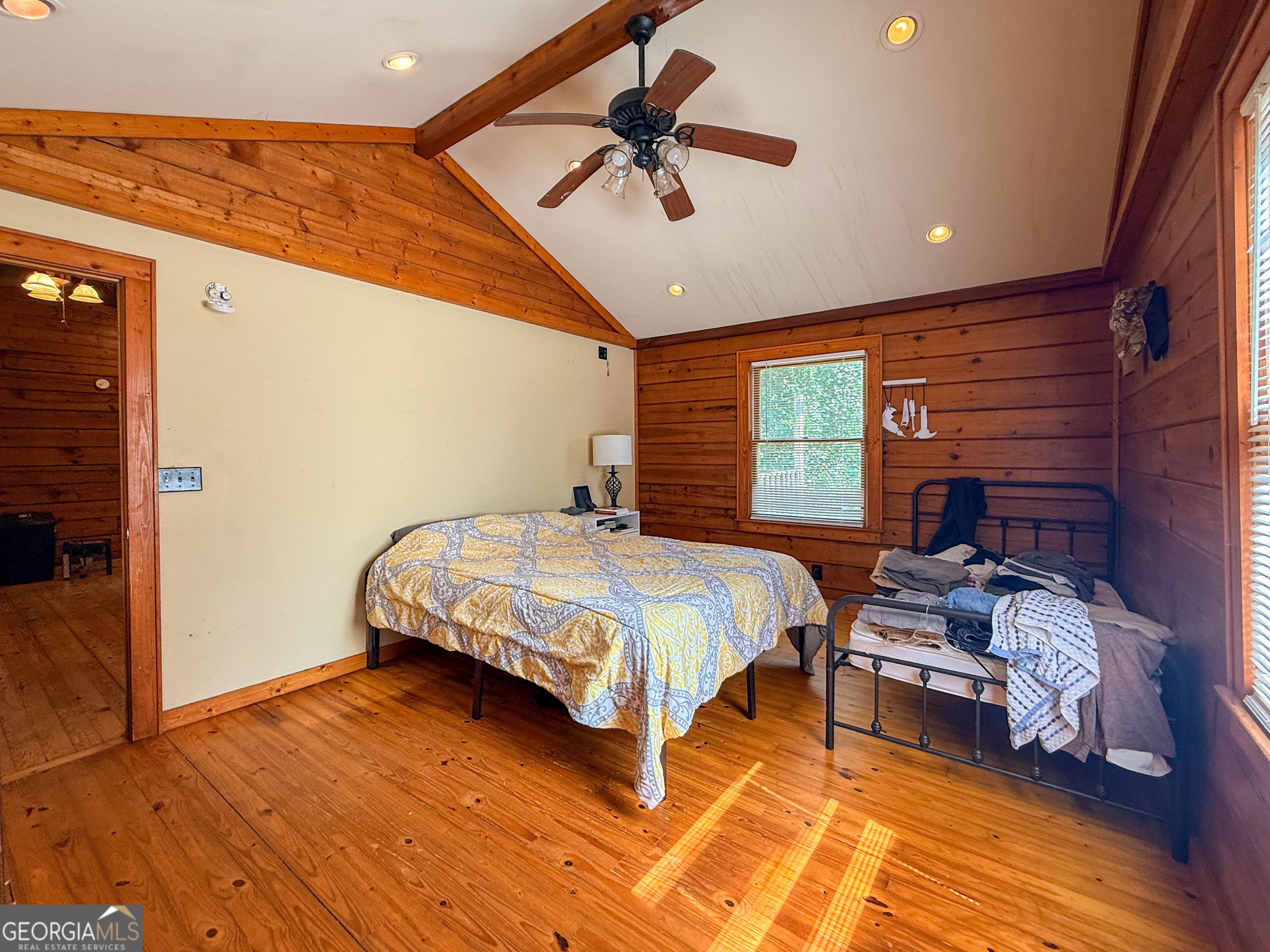 170 Hillcrest Street Cornelia, GA 30531 - Photo 14 of 18 a bedroom with a bed and a ceiling fan