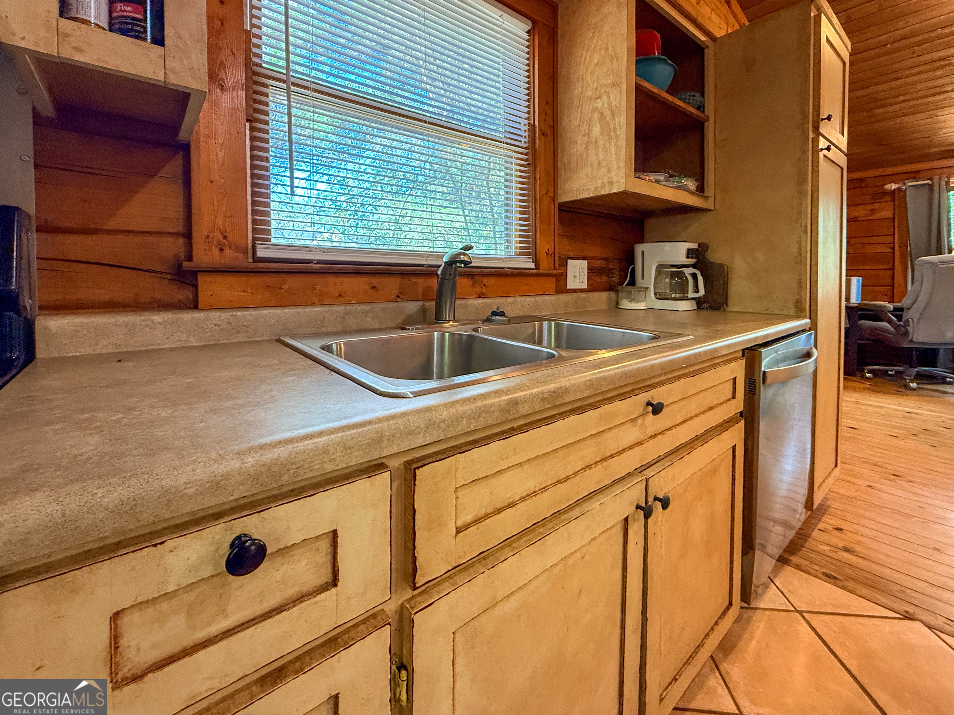 170 Hillcrest Street Cornelia, GA 30531 - Photo 6 of 18 a kitchen with stainless steel appliances granite countertop a sink and a cabinets