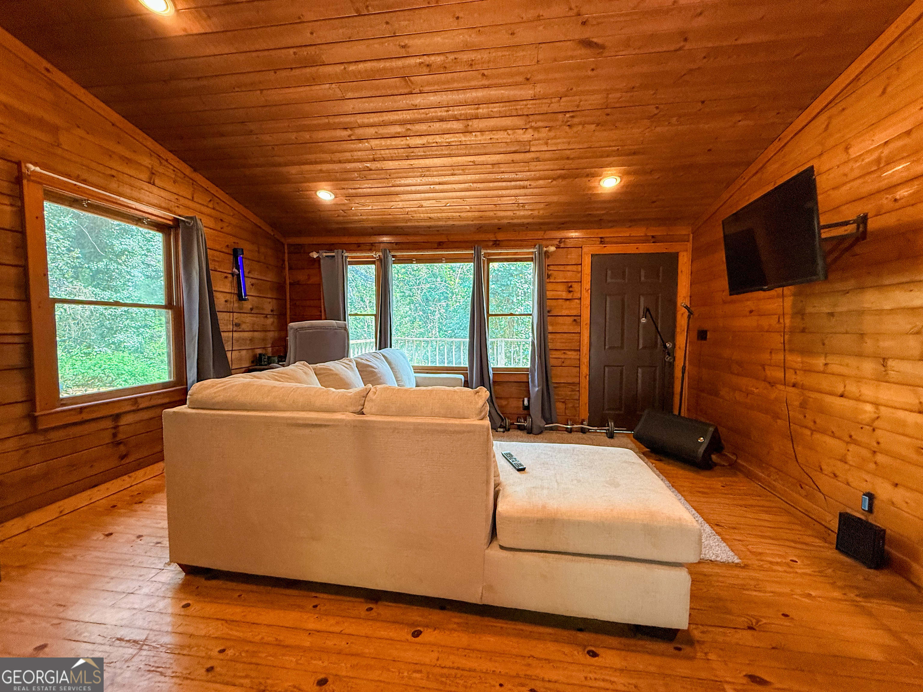 170 Hillcrest Street Cornelia, GA 30531 - Photo 8 of 18 a bed sitting in a spacious bedroom next to a window