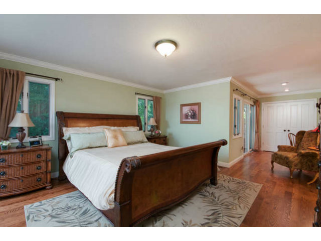 167 Springdale Way Redwood City, CA 94062 - Photo 9 of 25 a bedroom with a bed and window