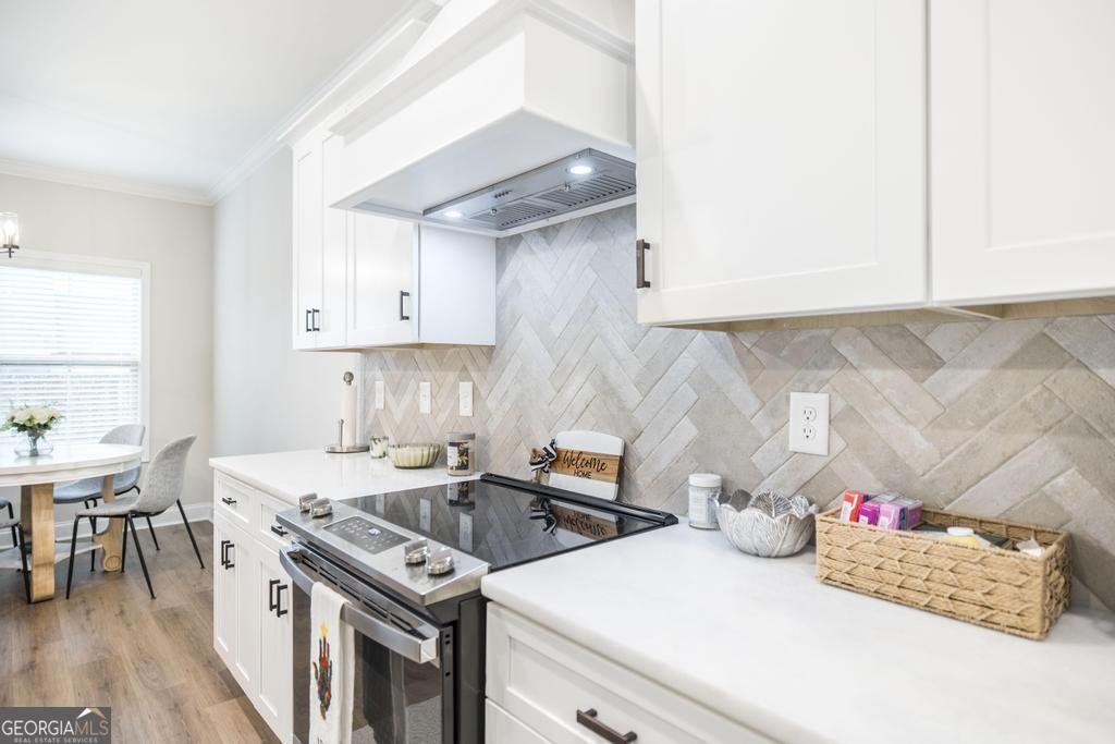 111 Fieldview Lane Kathleen, GA 31047 - Photo 13 of 36 a kitchen with a sink stove and cabinets