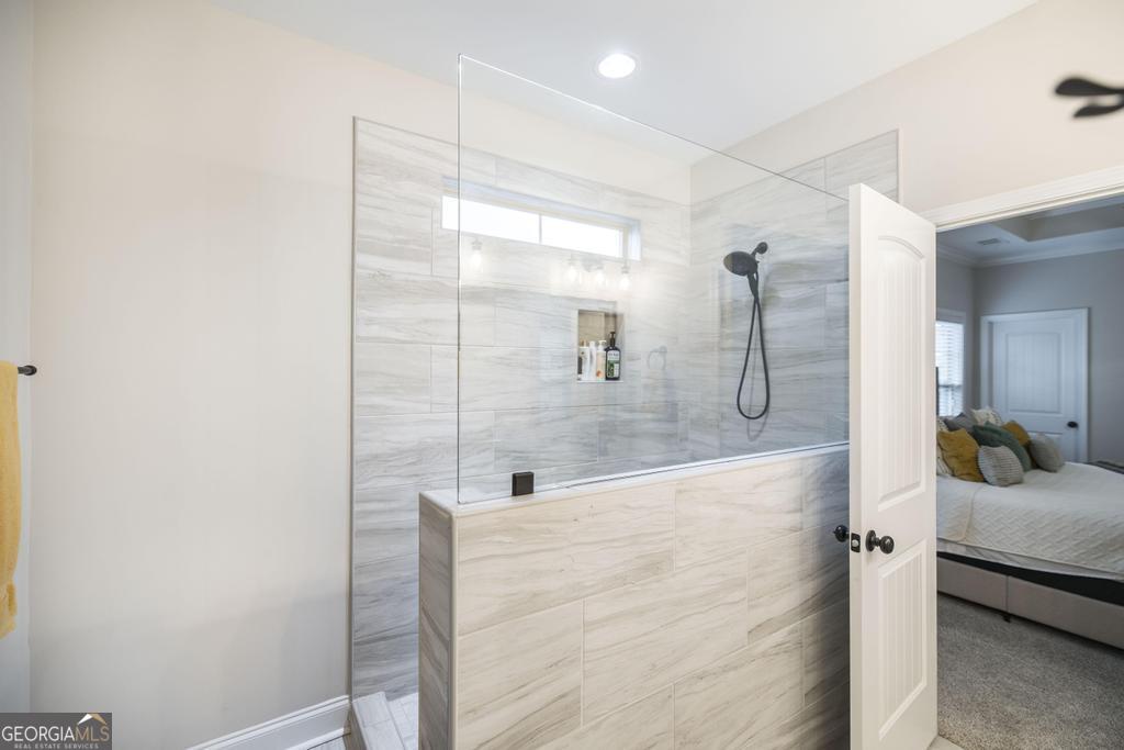 111 Fieldview Lane Kathleen, GA 31047 - Photo 19 of 36 a bathroom with a shower and a sink