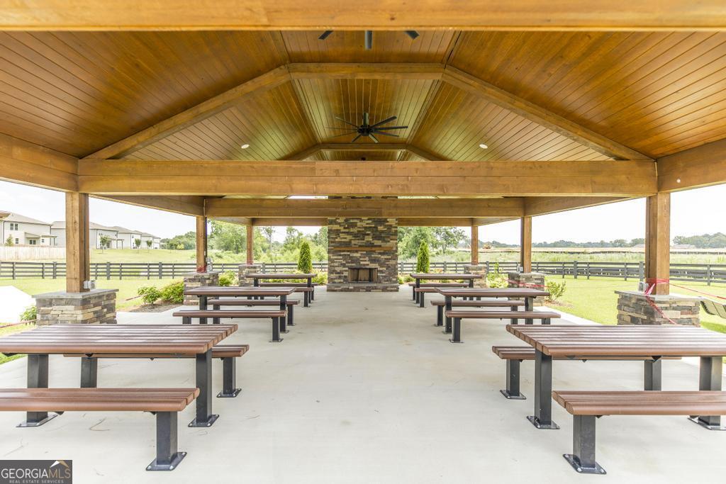 111 Fieldview Lane Kathleen, GA 31047 - Photo 34 of 36 a living room with furniture and floor to ceiling windows