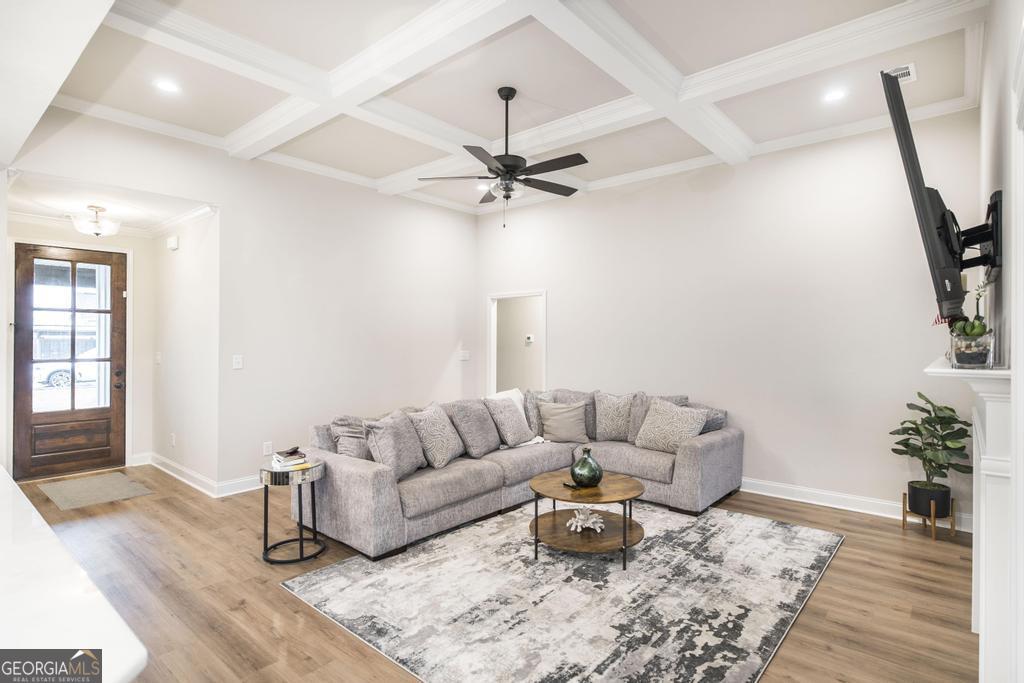 111 Fieldview Lane Kathleen, GA 31047 - Photo 8 of 36 a living room with furniture and a wooden floor