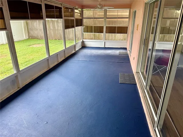 a view of entryway with wooden floor and door