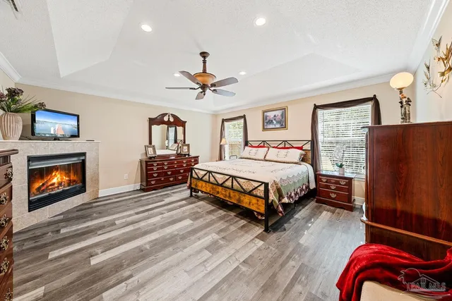 a bed room with a bed and a fireplace